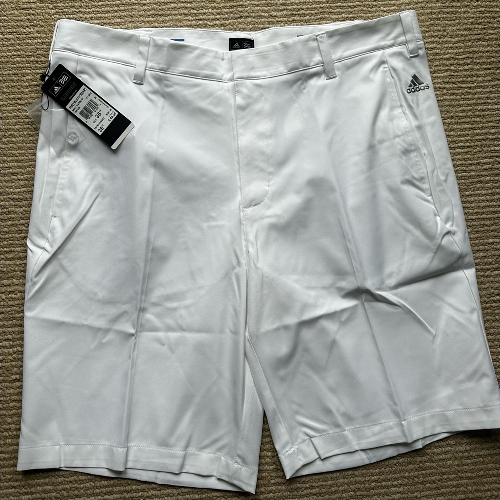 NWT Adidas Men’s gold shorts, size 36